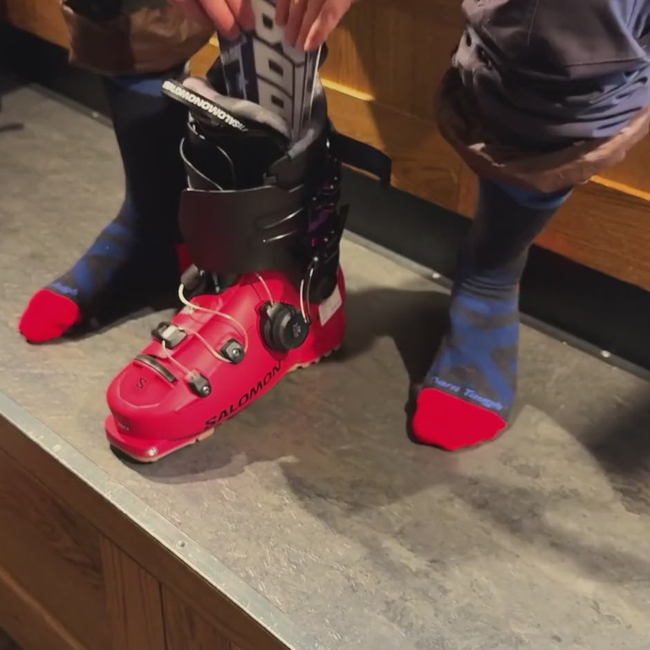 How to use Boot Bib®: push it into the boot, slide your foot in, pull it out